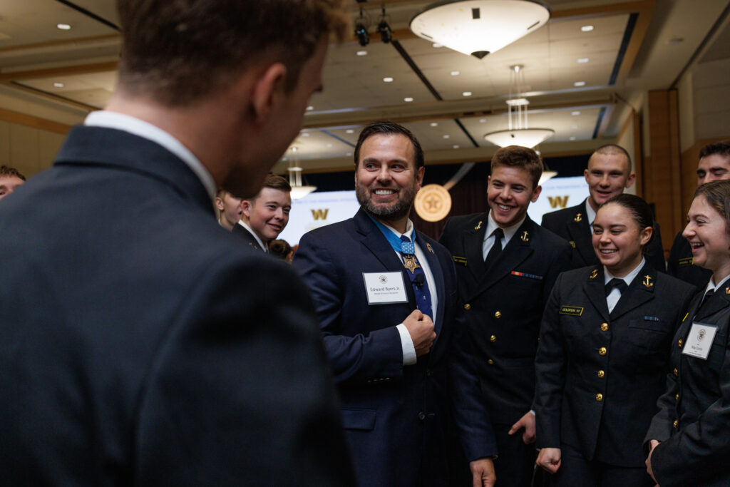 Honoring National Medal of Honor Day: Why It Matters and How You Can Take Part 1 six men and women in frame dressed in military uniform smiling
