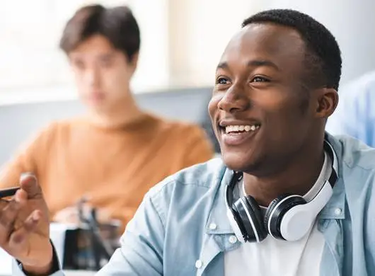 Man Smiling in class