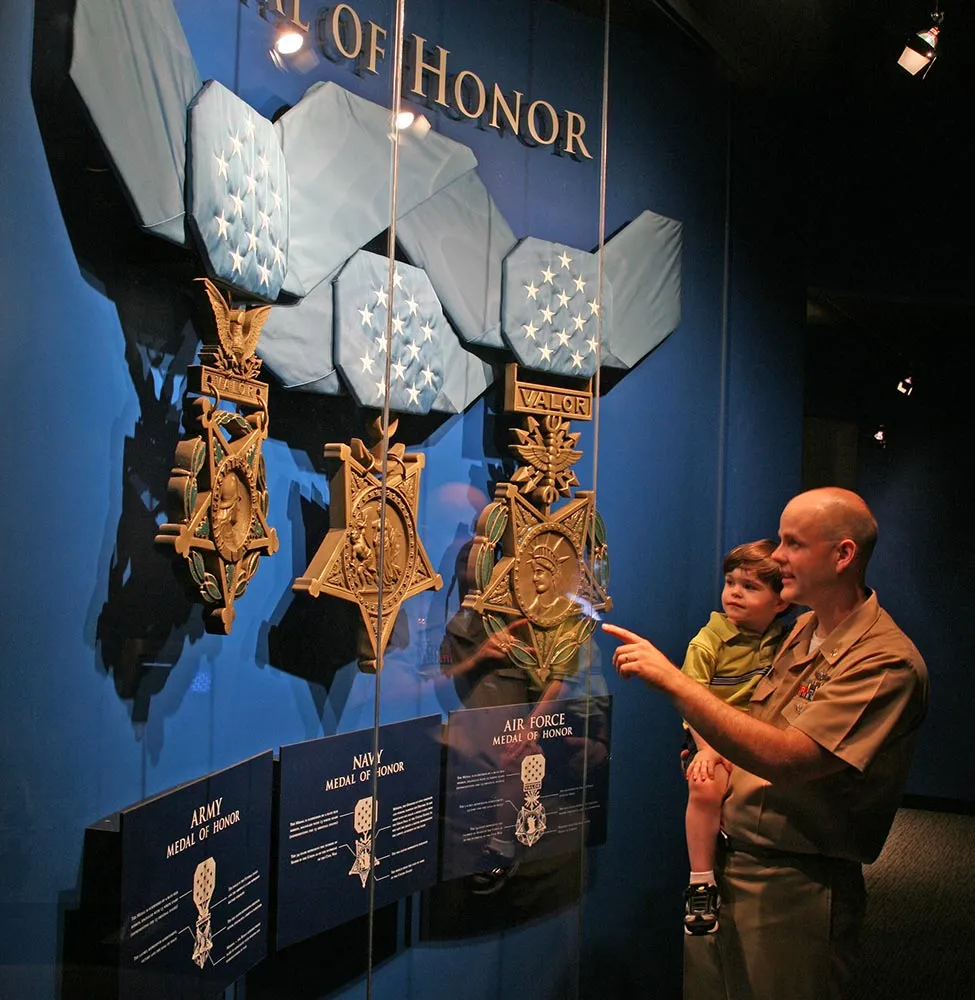Medal of Honor 6 Soldier holding his kid in the museum